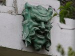 Détail sur une façade : tête de personnage mythologique © Conseil Départemental de la Seine-Saint-Denis